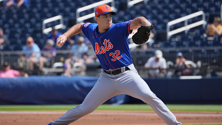 Feb 26, 2024; West Palm Beach, Florida, USA;  New York Mets starting pitcher Max Kranick (32) pitches against the Washington Nationals in the first inning at CACTI Park of the Palm Beaches. Mandatory Credit: Jim Rassol-Imagn Images
