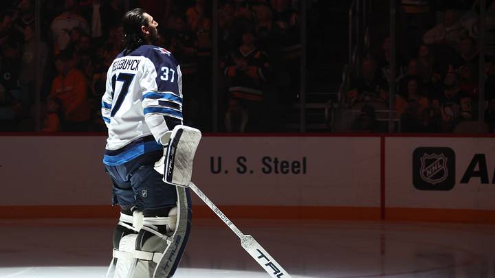 Mar 21, 2026; Pittsburgh, Pennsylvania, USA;  Winnipeg Jets goaltender Connor Hellebuyck (37) stands for the national anthem against the Pittsburgh Penguins at PPG Paints Arena. Mandatory Credit: Charles LeClaire-Imagn Images