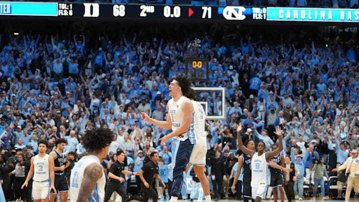 North Carolina guard Seth Trimble leaps with forward Zayden High after hitting the game-winning shot against Duke.
