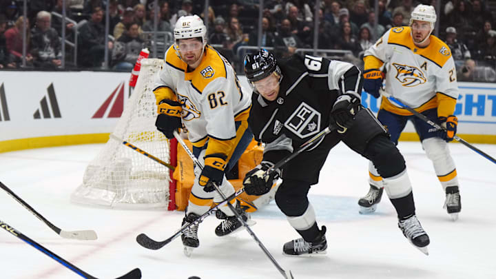 Jan 18, 2024; Los Angeles, California, USA; Nashville Predators center Tommy Novak (82) and LA Kings