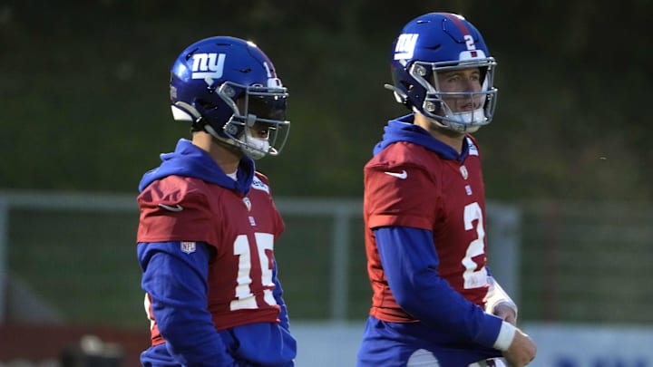 Nov 8, 2024; Munich, Germany; New York Giants quarterbacks Drew Lock (2) and Tommy DeVito (15) during practice at the FC Bayern Munchen training grounds at Sabener Strasse.  Mandatory Credit: Kirby Lee-Imagn Images