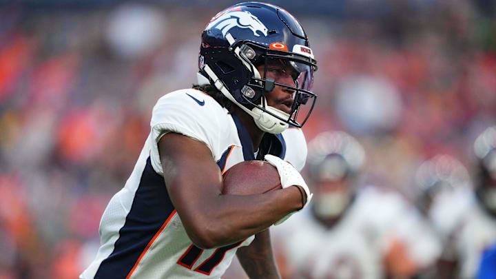 Aug 26, 2023; Denver, Colorado, USA; Denver Broncos wide receiver Lil'Jordan Humphrey (17) carries the ball in the first quarter against the Los Angeles Rams at Empower Field at Mile High. Mandatory Credit: Ron Chenoy-Imagn Images