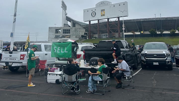 Oakland A's fans tailgate prior to Thursday's final game at the Coliseum.