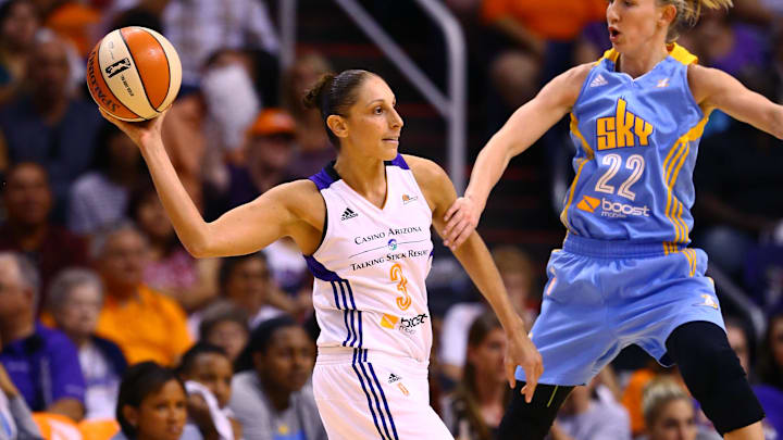 Sep 7, 2014; Phoenix, AZ, USA; Phoenix Mercury guard Diana Taurasi (3) passes the ball under pressure from Chicago Sky guard Courtney Vandersloot (22) during game one of the WNBA Finals at US Airways Center. The Mercury defeated the Sky 83-62. Mandatory Credit: Mark J. Rebilas-Imagn Images
