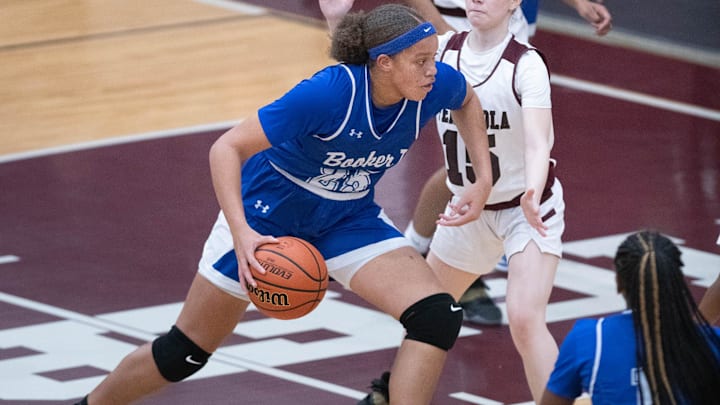 Chamiah Francis (25) drives to the hoop during the Booker T. Washington vs Pensacola girls basketball game at Pensacola High School on Friday, Jan. 20, 2023.

Washington Vs Pensacola Girls Basketball