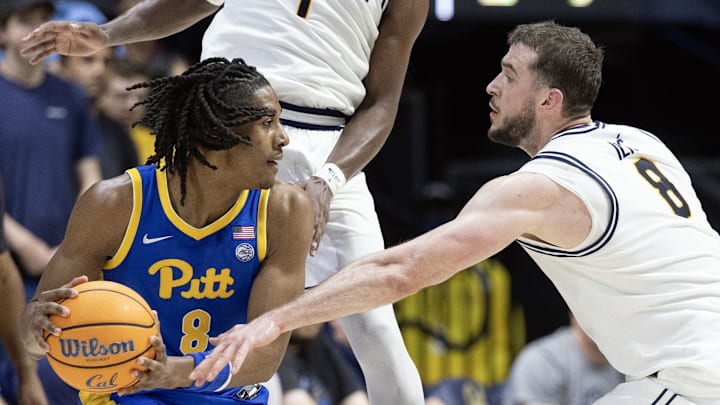 Cal's Milos Ilic pressures Pitt guard Omari Witherspoon