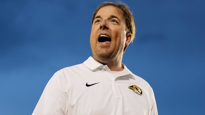 Sep 21, 2024; Columbia, Missouri, USA; Missouri Tigers head coach Eliah Drinkwitz reacts after defeating the Vanderbilt Commodores in double overtime at Faurot Field at Memorial Stadium. Mandatory Credit: Jay Biggerstaff-Imagn Images Sep 21, 2024; Columbia, Missouri, USA; Missouri Tigers head coach Eliah Drinkwitz reacts after defeating the Vanderbilt Commodores in double overtime at Faurot Field at Memorial Stadium. Mandatory Credit: Jay Biggerstaff-Imagn Images