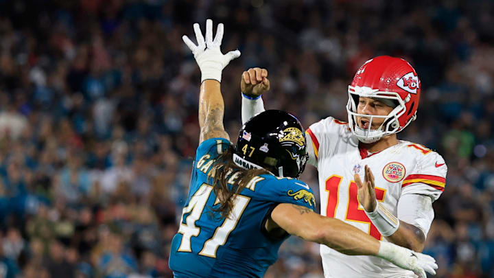 Jacksonville Jaguars linebacker Dennis Gardeck (47) pressures Kansas City Chiefs quarterback Patrick Mahomes (15) during the first quarter of an NFL football matchup at EverBank Stadium, Monday, Oct. 6, 2025, in Jacksonville, Fla. The Jacksonville Jaguars edged the Kansas City Chiefs 31-28. [Corey Perrine/Florida Times-Union]