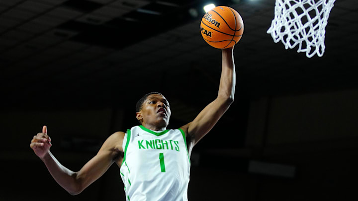 St. Mary’s forward Cameron Williams (1) dunks against Deer Valley during the 4A State Championship at Veterans Memorial Coliseum in Phoenix on March 6, 2025.
