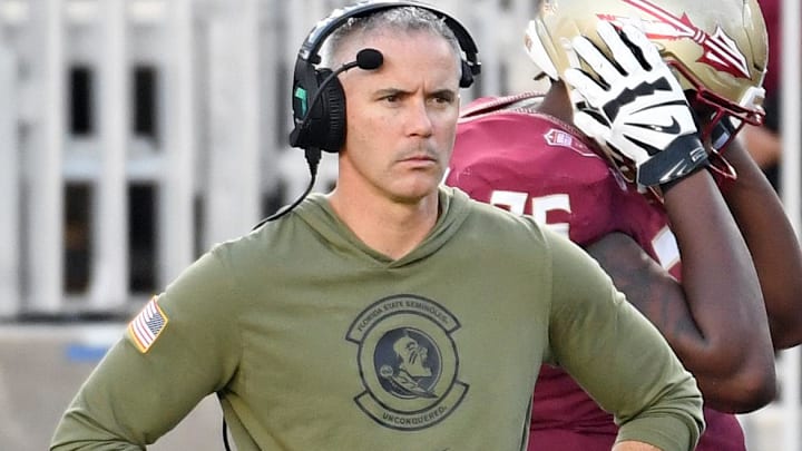 Nov 2, 2024; Tallahassee, Florida, USA; Florida State Seminoles head coach Mike Norvell looks on from the sideline after the North Carolina Tarheels score a final touchdown in the fourth quarter at Doak S. Campbell Stadium. Mandatory Credit: Robert Myers-Imagn Images