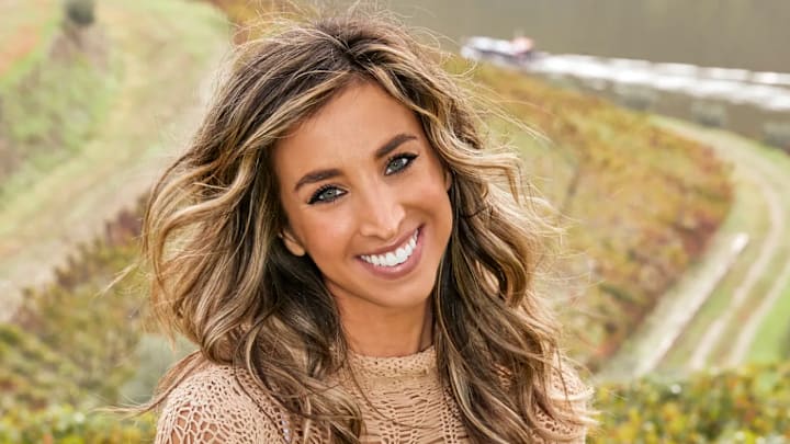 Katie Austin was photographed by Ben Watts in Portugal. Swimsuit by Andi Bagus. Top by Natalia Fedner. 