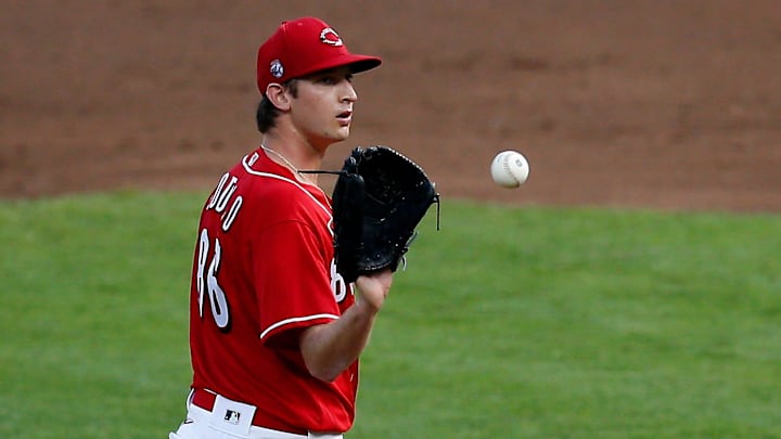 Cincinnati Reds starting pitcher Nick Lodolo (86) receives a new ball after giving up a two-run home run.