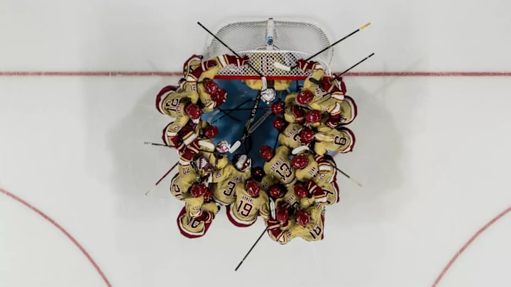 Boston College huddle up before a matchup with No. 14 Colgate in the Eagles first game of 2026.