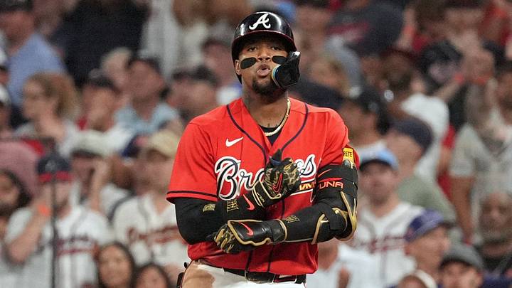 Oct 1, 2026; Cumberland, Georgia, USA; Atlanta Braves outfielder Ronald Acuna Jr. (13) reacts after hitting a single against the Philadelphia Phillies during the third inning in game three of the Wildcard round for the 2026 MLB Playoffs at Truist Field. Mandatory Credit: Dale Zanine-Imagn Images Oct 1, 2026; Cumberland, Georgia, USA; Atlanta Braves outfielder Ronald Acuna Jr. (13) reacts after hitting a single against the Philadelphia Phillies during the third inning in game three of the Wildcard round for the 2026 MLB Playoffs at Truist Field. Mandatory Credit: Dale Zanine-Imagn Images