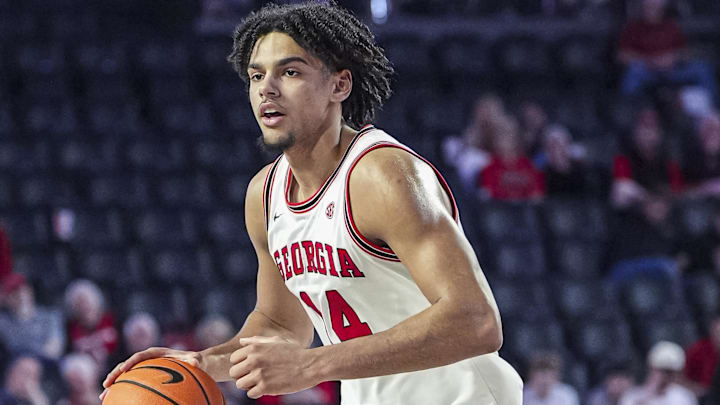 Feb 5, 2025; Athens, Georgia, USA; Georgia Bulldogs forward Asa Newell (14) handles the ball against the LSU Tigers during the second half at Stegeman Coliseum. Mandatory Credit: Dale Zanine-Imagn Images