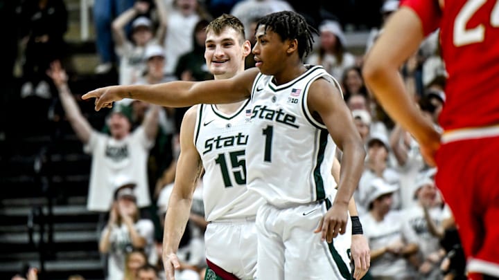 Michigan State's Carson Cooper, left, celebrates his 3-pointer against Maryland with Jeremy Fears Jr. during the first half on Saturday, Jan. 24, 2026, at the Breslin Center in East Lansing.