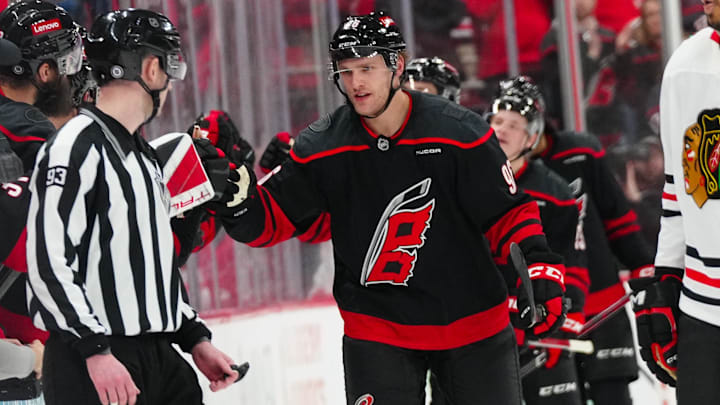 Jan 30, 2025; Raleigh, North Carolina, USA; Carolina Hurricanes right wing Mikko Rantanen (96) celebrates his goal against the Chicago Blackhawks during the second period at Lenovo Center. Mandatory Credit: James Guillory-Imagn Images