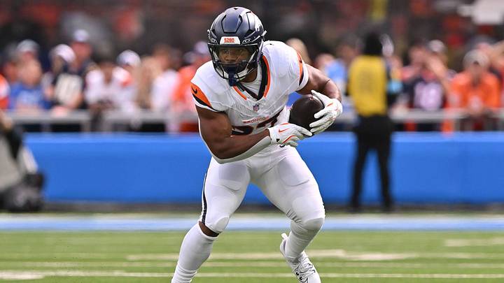 INGLEWOOD, CA - OCTOBER 11: Denver Broncos running back J.K. Dobbins 27 carries the ball during the game between the Los Angeles Chargers and the Denver Broncos on October 11, 2026 at SoFi Stadium in Inglewood. INGLEWOOD, CA - OCTOBER 11: Denver Broncos running back J.K. Dobbins 27 carries the ball during the game between the Los Angeles Chargers and the Denver Broncos on October 11, 2026 at SoFi Stadium in Inglewood.