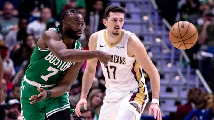 Jan 31, 2025; New Orleans, Louisiana, USA; Boston Celtics guard Jaylen Brown (7) passes the ball against New Orleans Pelicans center Karlo Matkovic (17) during the second half at Smoothie King Center. Mandatory Credit: Stephen Lew-Imagn Images Jan 31, 2025; New Orleans, Louisiana, USA; Boston Celtics guard Jaylen Brown (7) passes the ball against New Orleans Pelicans center Karlo Matkovic (17) during the second half at Smoothie King Center. Mandatory Credit: Stephen Lew-Imagn Images