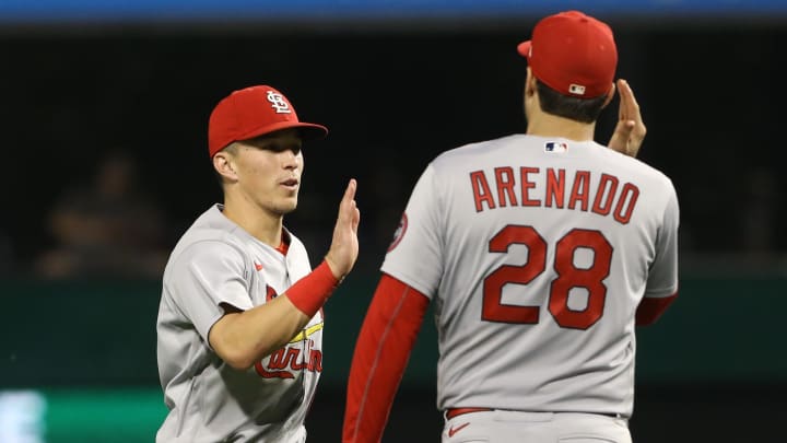 Aug 27, 2021; Pittsburgh, Pennsylvania, USA; St. Louis Cardinals second baseman Tommy Edman (19) and third baseman Nolan Arenado (28) celebrate after defeating the Pittsburgh Pirates at PNC Park. The Cardinals won 4-3. Mandatory Credit: Charles LeClaire-USA TODAY Sports Aug 27, 2021; Pittsburgh, Pennsylvania, USA; St. Louis Cardinals second baseman Tommy Edman (19) and third baseman Nolan Arenado (28) celebrate after defeating the Pittsburgh Pirates at PNC Park. The Cardinals won 4-3. Mandatory Credit: Charles LeClaire-USA TODAY Sports