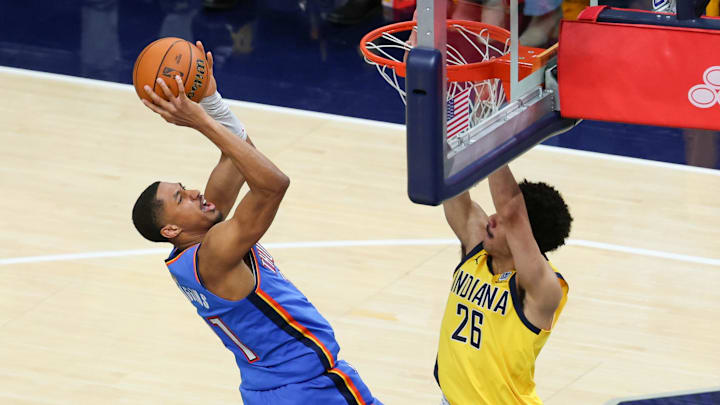 Jun 19, 2025; Indianapolis, Indiana, USA; Oklahoma City Thunder guard Aaron Wiggins (21) shoots the ball defended by Indiana Pacers guard Ben Sheppard (26) in the fourth quarter during game six of the 2025 NBA Finals at Gainbridge Fieldhouse. Jun 19, 2025; Indianapolis, Indiana, USA; Oklahoma City Thunder guard Aaron Wiggins (21) shoots the ball defended by Indiana Pacers guard Ben Sheppard (26) in the fourth quarter during game six of the 2025 NBA Finals at Gainbridge Fieldhouse.
