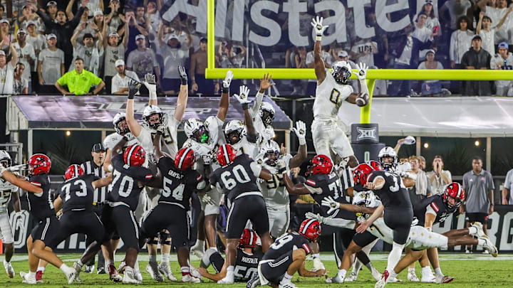 Aug 28, 2025; Orlando, Florida, USA; UCF Knights linebacker Keli Lawson (0) blocks a field goal attempt during the second quarter against the Jacksonville State Gamecocks at Acrisure Bounce House. Mandatory Credit: Mike Watters-Imagn Images