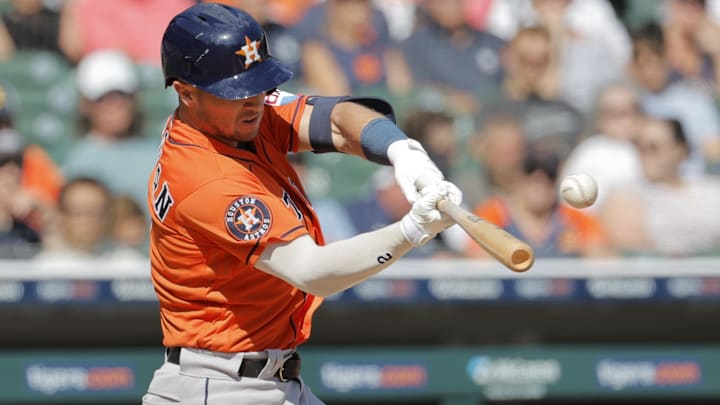 Aug 27, 2023; Detroit, Michigan, USA;  Houston Astros third baseman Alex Bregman (2) hits a single in the eighth inning against the Detroit Tigers at Comerica Park.