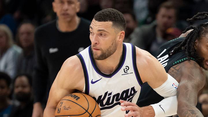 Dec 14, 2025; Minneapolis, Minnesota, USA; Sacramento Kings guard Zach LaVine (8) protects the ball defended by Minnesota Timberwolves guard Bones Hyland (8) during the first half at Target Center. Dec 14, 2025; Minneapolis, Minnesota, USA; Sacramento Kings guard Zach LaVine (8) protects the ball defended by Minnesota Timberwolves guard Bones Hyland (8) during the first half at Target Center.