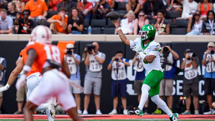 Oregon quarterback Dante Moore throws a pass as the Oregon Ducks face the Oklahoma State Cowboys on Sept. 12, 2026, at Boone Pickens Stadium in Stillwater, Oklahoma.