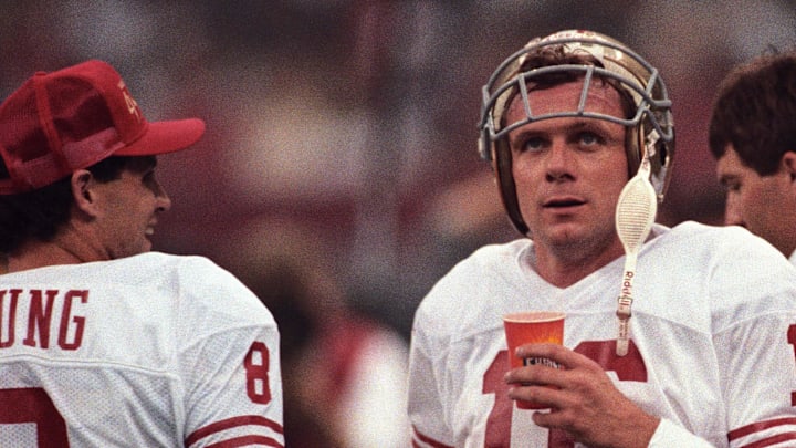 San Francisco 49ers quarterback Joe Montana (16) on the sidelines with quarterback Steve Young (8)