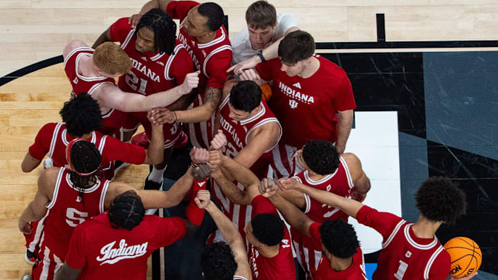 The Indiana Hoosiers huddle Thursday, March 13, 2025, before their game against the Oregon Ducks in the 2025 TIAA Big Ten Men’s Basketball Tournament at Gainbridge Fieldhouse in Indianapolis.