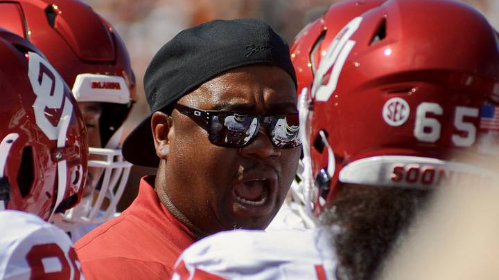 Oklahoma defensive tackles coach Todd Bates leads his team through warmups before facing Texas. Oklahoma defensive tackles coach Todd Bates leads his team through warmups before facing Texas.