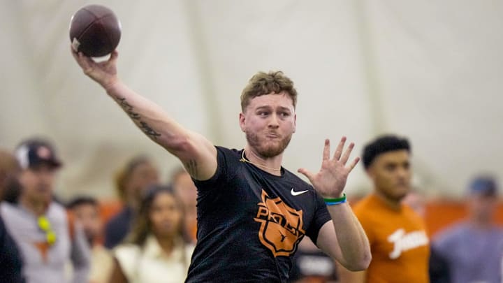 Former Longhorns Quinn Ewers passes during the Texas' Pro Day at the Texas Football Training Facility on Tuesday, March 25, 2025. Former Longhorns Quinn Ewers passes during the Texas' Pro Day at the Texas Football Training Facility on Tuesday, March 25, 2025.