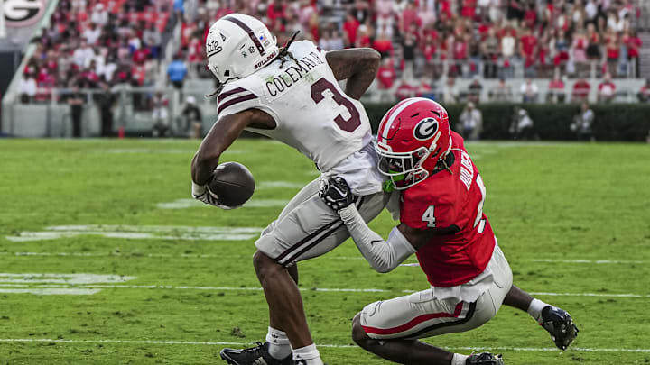 Oct 12, 2024; Athens, Georgia, USA; Georgia Bulldogs defensive back KJ Bolden (4) tackles Mississippi State Bulldogs wide receiver Kevin Coleman Jr. (3) short on the end zone during the second half at Sanford Stadium. Mandatory Credit: Dale Zanine-Imagn Images