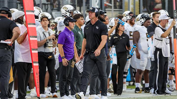 Aug 28, 2025; Orlando, Florida, USA; UCF Knights head coach Scott Frost walks the sideline during the first quarter against the Jacksonville State Gamecocks at Acrisure Bounce House. Mandatory Credit: Mike Watters-Imagn Images Aug 28, 2025; Orlando, Florida, USA; UCF Knights head coach Scott Frost walks the sideline during the first quarter against the Jacksonville State Gamecocks at Acrisure Bounce House. Mandatory Credit: Mike Watters-Imagn Images