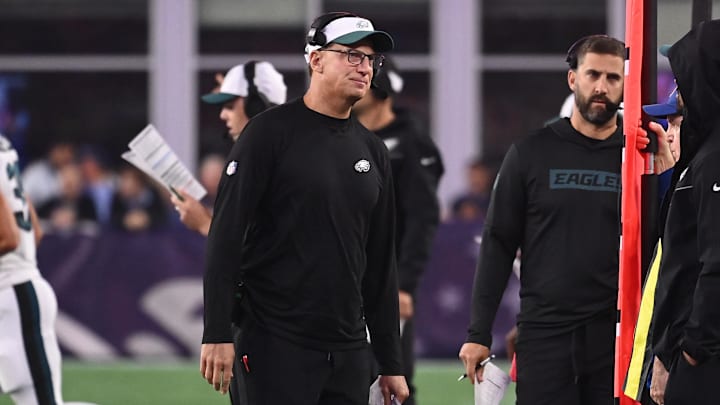 Aug 15, 2024; Foxborough, MA, USA; Philadelphia Eagles quarterbacks coach Doug Nussmeier works on the sideline during the first half against the New England Patriots at Gillette Stadium. Mandatory Credit: Eric Canha-Imagn Images