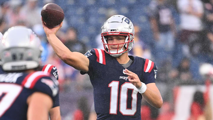 August 8, 2024; Foxborough, MA, USA;  New England Patriots quarterback Drake Maye (10) warms up before a game against the Carolina Panthers at Gillette Stadium.
