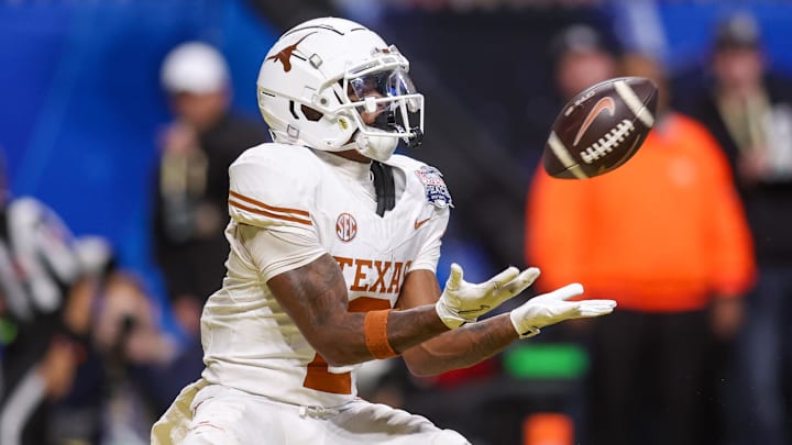 Jan 1, 2025; Atlanta, GA, USA; Texas Longhorns wide receiver Matthew Golden (2) catches a pass for a touchdown against the Arizona State Sun Devils in overtime at Mercedes-Benz Stadium.