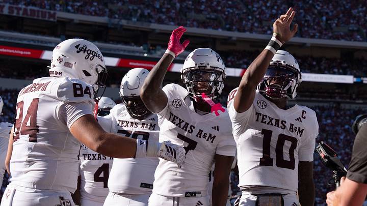 Oct 24, 2026; Tuscaloosa, AL, USA;  Texas A&M quarterback Marcel Reed (10) celebrates his running touchdown with teammates during the game with Alabama at Saban Field at Bryant Denny Stadium. Mandatory Credit: Gary Cosby Jr.-Tuscaloosa News