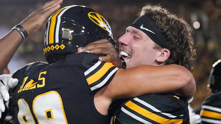 Aug 28, 2025; Columbia, Missouri, USA; Missouri Tigers tight end Jude James (89) celebrates with tight end Brett Norfleet (87) after scoring against the Central Arkansas Bears during the second half of the game at Faurot Field at Memorial Stadium.
