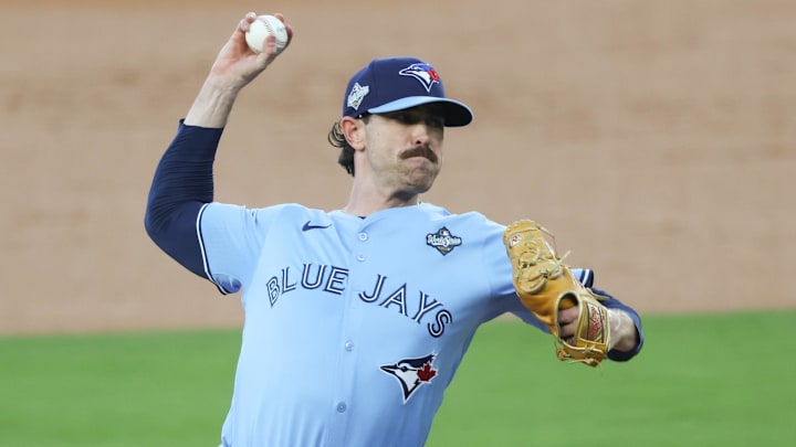 Oct 28, 2025; Los Angeles, California, USA; Toronto Blue Jays pitcher Shane Bieber (57) pitches during the first inning against the Los Angeles Dodgers during game four of the 2025 MLB World Series at Dodger Stadium. Mandatory Credit: Kiyoshi Mio-Imagn Images