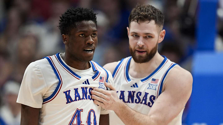 Kansas Jayhawks forward Flory Bidunga (40) and center Hunter Dickinson (1)