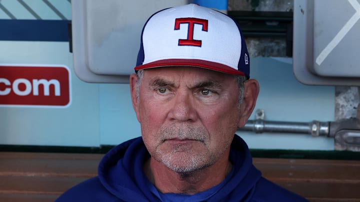 Sep 28, 2024; Anaheim, California, USA;  Texas Rangers manager Bruce Bochy (15) sits in the dugout prior to a game against the Los Angeles Angels at Angel Stadium