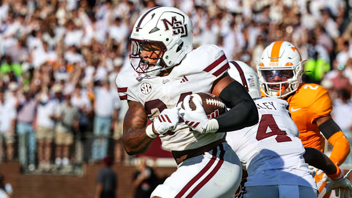 Mississippi State Bulldogs running back Fluff Bothwell (24) runs with the ball against the Tennessee Volunteers during the first half at Davis Wade Stadium at Scott Field.
