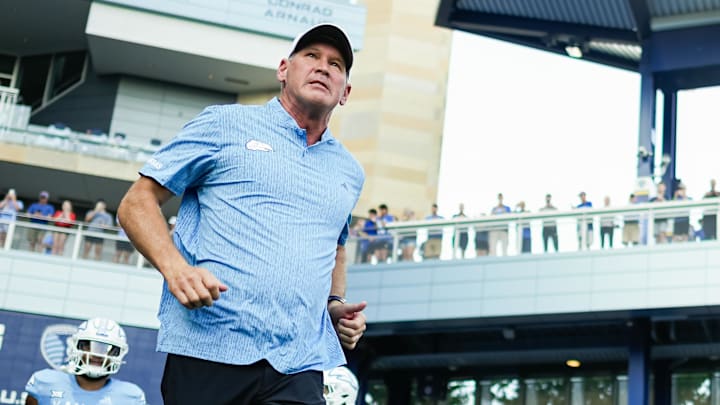 Aug 29, 2024; Kansas City, Kansas, USA; Kansas Jayhawks head coach Lance Leipold takes the field before a game against the Lindenwood Lions at Children's Mercy Park. Mandatory Credit: Jay Biggerstaff-Imagn Images