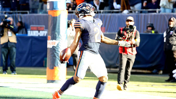 Nov 23, 2025; Chicago, Illinois, USA; Chicago Bears wide receiver DJ Moore (2) reacts after making a touchdown catch against the Pittsburgh Steelers during the second half at Soldier Field. Mandatory Credit: Mike Dinovo-Imagn Images