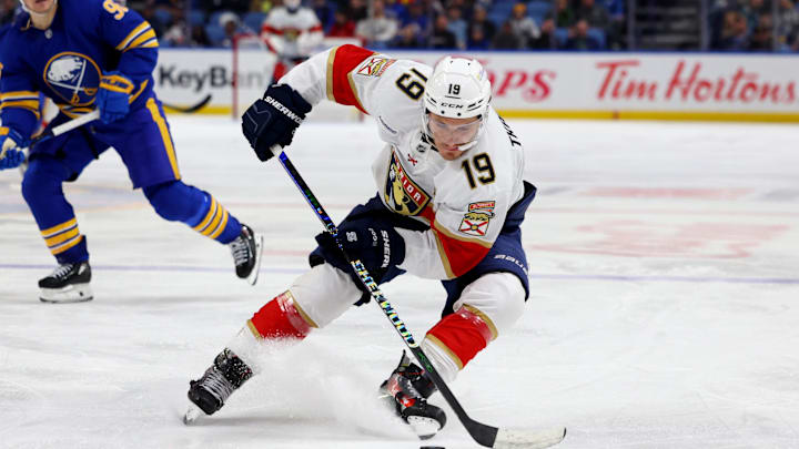 Oct 28, 2024; Buffalo, New York, USA;  Florida Panthers left wing Matthew Tkachuk (19) controls the puck during the third period against the Buffalo Sabres at KeyBank Center. Mandatory Credit: Timothy T. Ludwig-Imagn Images