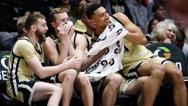 Purdue Boilermakers guards Braden Smith. Fletcher Loyer (2) and forward Trey Kaufman-Renn (4) celebrate on the bench