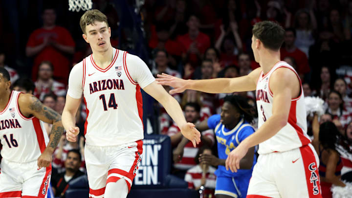 Jan 20, 2024; Tucson, Arizona, USA; Arizona Wildcats center Motiejus Krivas (14) celebrates a basket with guard Pelle Larsson (3) against the UCLA Bruins during the first half at McKale Center. Jan 20, 2024; Tucson, Arizona, USA; Arizona Wildcats center Motiejus Krivas (14) celebrates a basket with guard Pelle Larsson (3) against the UCLA Bruins during the first half at McKale Center.