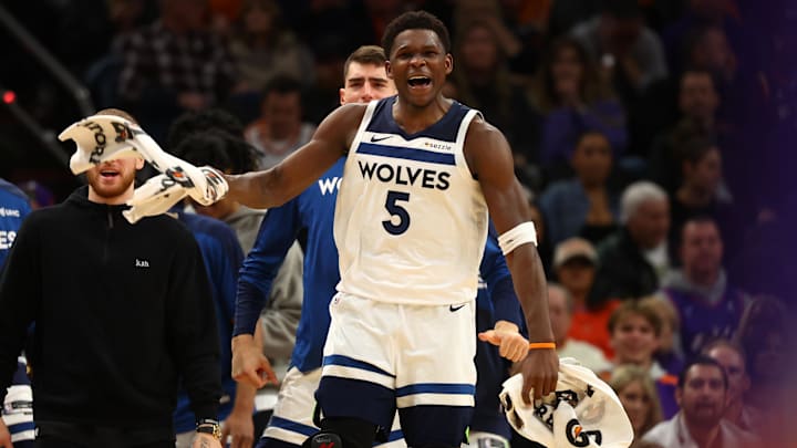 Jan 29, 2025; Phoenix, Arizona, USA; Minnesota Timberwolves guard Anthony Edwards (5) reacts against the Phoenix Suns in the second half at Footprint Center. 